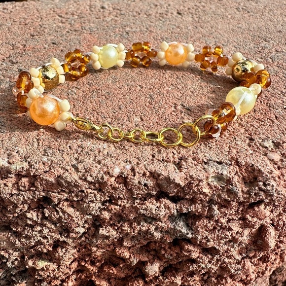 Orange, Gold, and Yellow Floral Adjustable Bracelet w Gold Colored Accents - Picture 2 of 2